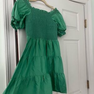 A beautiful green Alice and Olivia dress that zips and ties in the back